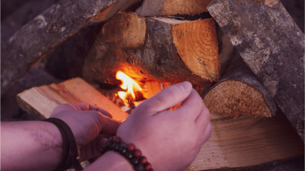 How To Build A Campfire In 6 Easy Steps (Fast) 22 A campfire being started